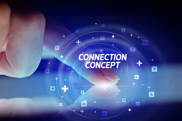 Finger touching tablet with social media icons concept