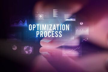 Finger touching tablet with business graphs and icons concept