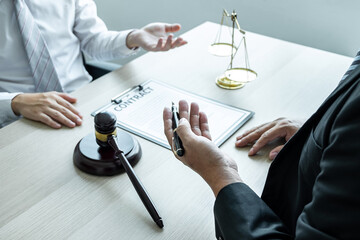 Professional Male lawyer or counselor discussing negotiation legal case with client meeting with...