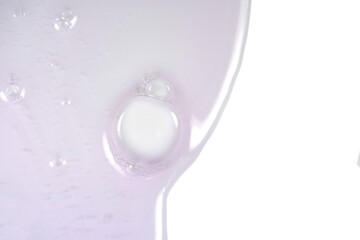 Cream gel transparent cosmetic serum oil sample texture with bubbles background. Shampoo texture.