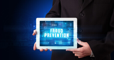 Person holding tablet, security concept