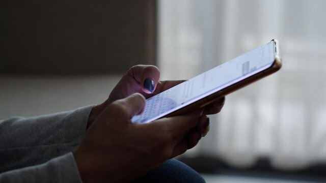 Hand woman using the cell smartphone to send text chat messages mobile to people