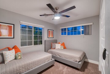 A bedroom with twin beds
