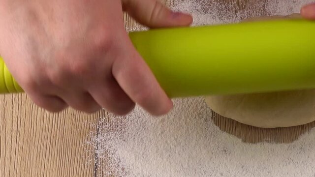 The process of making cookies from shortbread dough.