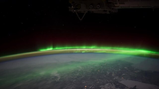 Aurora Borealis over Canada.
The International Space Station.
Source material was provided by NASA.
Color correction was done, noise was removed and slowed down.