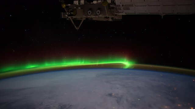 Aurora Borealis from U.S. to Atlantic Ocean.
The International Space Station.
Source material was provided by NASA.
Color correction was done, noise was removed and slowed down.