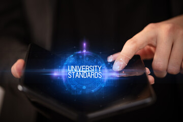 Young man holding a foldable smartphone