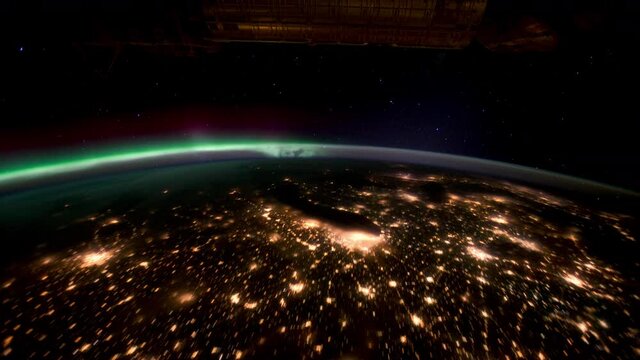 Aurora Borealis Pass over the United States at Night.
The International Space Station.
Source material was provided by NASA.
Color correction was done, noise was removed and slowed down.