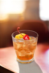 Tasty alcohol cocktail with gin, bitter and vermouth; in a luxury elegant home, homemade drink