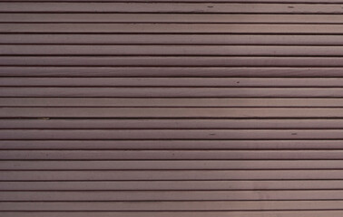 Texture of old external blinds on windows. Painted wooden surface. Creative background