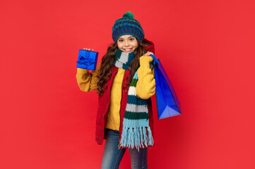 kid with package. happy birthday holiday. black friday discount. seasonal christmas sales.