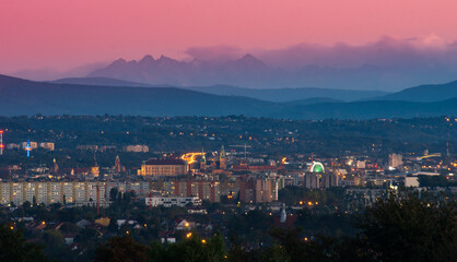Evening distant Krakow panorama with Tatra mountains in the background