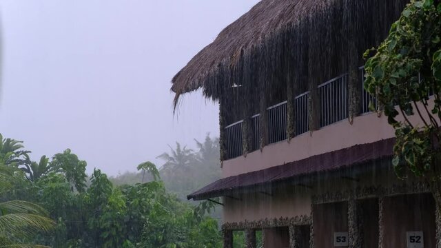 Rainy weather has come in over the village of Axim with thundering thunder in the background Ghana West Africa