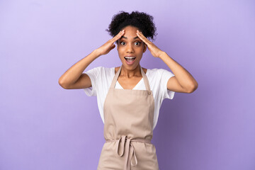 Restaurant waiter latin woman isolated on purple background with surprise expression
