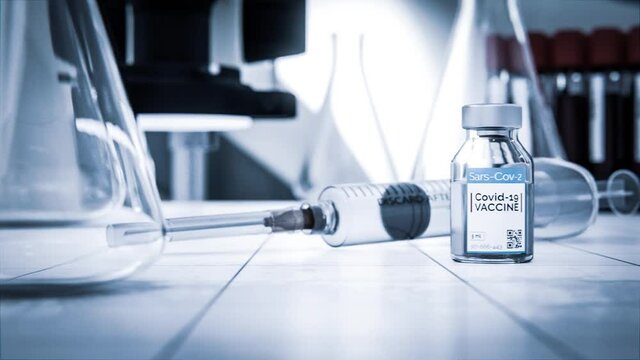 Corona Impfstoff oder Covid-19 Impfstoff mit Spritze - Thema Impf-Booster