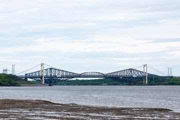 The two Quebec city bridge (Quebec bridge and Pierre-Laporte bridge) view from the north shore of...
