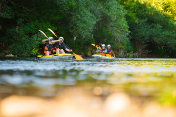 Two pairs kayaking