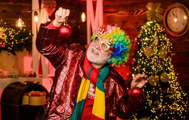 Mature man with white beard. Hocus pocus. Christmas spirit. Cheerful clown colorful hairstyle....