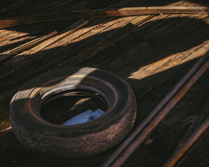 old tire on the floor of an abandoned building