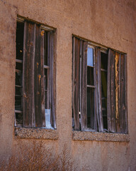 Broken windows on an abandoned building