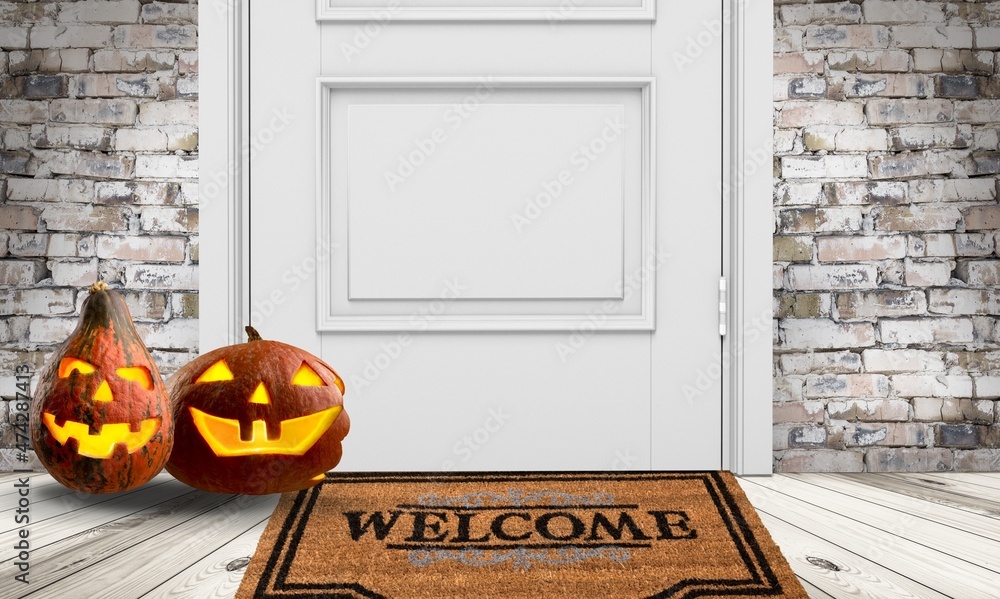 Wall mural smiling pumpkin, funny Halloween pumpkin on the doorstep.