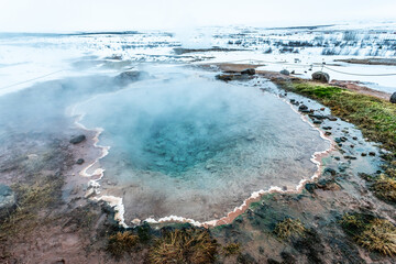 Geysir in winter landscape, Iceland