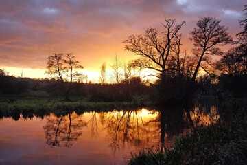 Winter sunset over the River Wey in Godalming, Surrey, UK