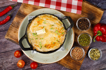 Classic French onion soup with grated cheese and parsley.