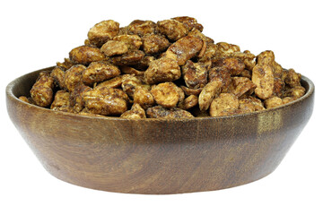 candied peanuts in a wooden bowl isolated on white background