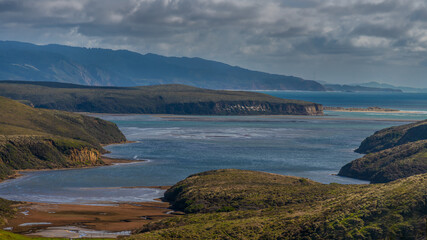 A cove off the Northern California coastline surrounded by the mountains and ocean