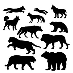 a set of silhouettes of predatory animals isolated on a white background.