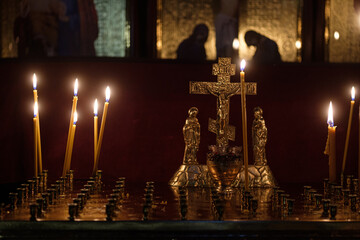 Burning candles in Orthodox church during the Christmas time.