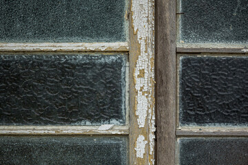 Old weathered timber casement window -closeup detail