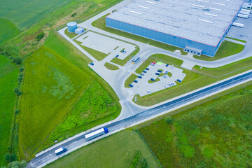 Aerial view of goods warehouse. Logistics center in industrial c
