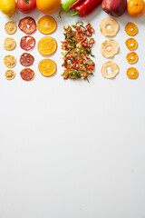 Assortment of Healthy and Tasty Dry Fruits on a White Background.