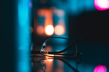 Fototapeta na wymiar Glasses in blurred lights