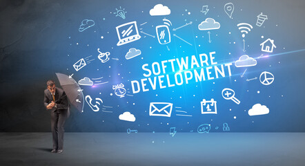 Businessman defending with umbrella, modern technology concept