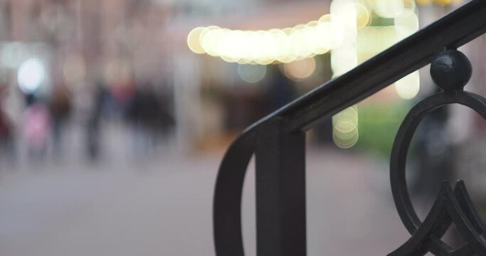 Moscow. Out of focus. People are walking along Arbat Street in the evening, intended only for pedestrians. Hand held.