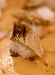 Shizuoka,Japan - December 10, 2021: Closeup of Anago or conger eel sushi
