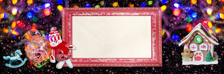 Frame with paper for greeting text on a Christmas widescreen background