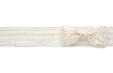 Burlap ribbon and bow with silver thread on white background, top view