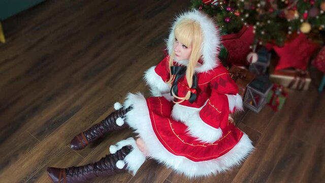 Little Red Riding Hood. New Year's elf. Sits on the floor.