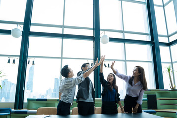 Happy business team,Successful team of young perspective business people in office. © visoot