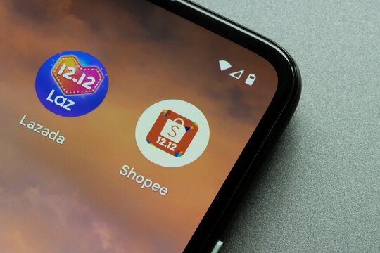 Portland, OR, USA - Dec 10, 2021: Shopee and Lazada Mobile app icons are seen on a Google Pixel smartphone before the Double 12 Sale Day. Shopee vs Lazada concept. E-commerce in Southeast Asia.