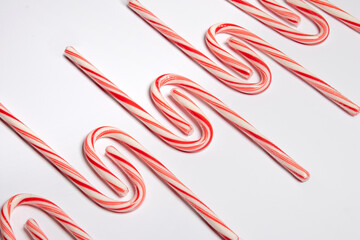 white candy cane Christmas background with unusual pattern