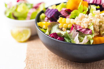Fresh organic vegetables salad with quinoa seed in bowl on white background, Healthy Vegan food