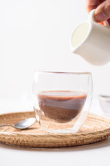 hot chocolate in a glass on a white background
