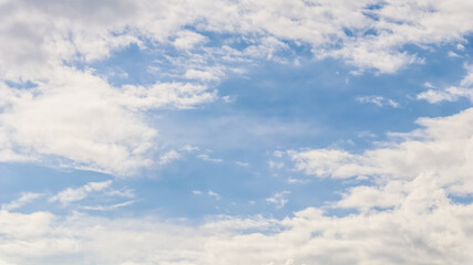 Background of blue sky with beautiful natural white clouds.