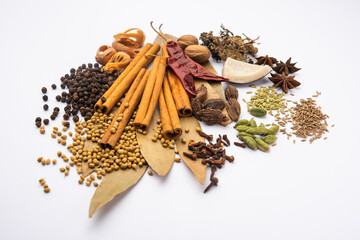 Indian Garam masala powder and colourful spices. selective focus