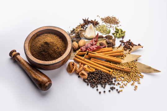 Indian Garam masala powder and colourful spices. selective focus